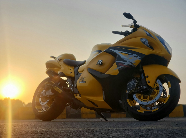 Yellow sport motorcycle at sunset